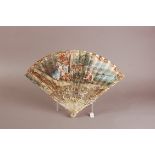 An 18th century carved ivory and paper leaf fan, 28cm, intricately carved and painted stick with spy