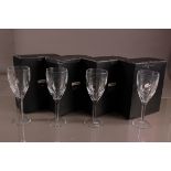 A set of Modern Waterford Crystal cut glass wine glasses designed by John Rocha, 25cm, in four boxes