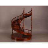 A nice model of a spiral wooden staircase, 61.5cm high and 46cm diameter at base