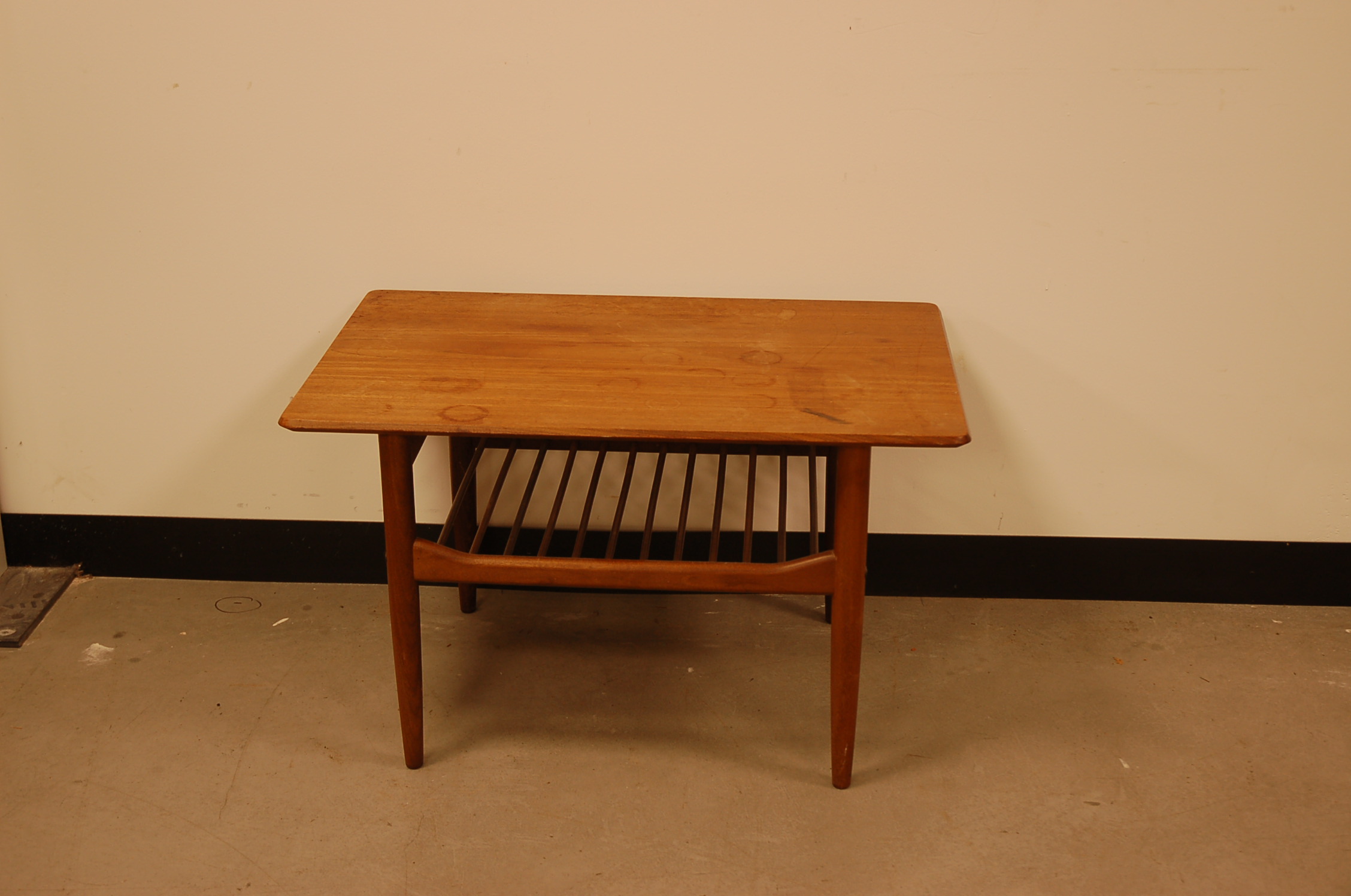 A small 1960s teak coffee table from G-Plan, tapered supports, with rectangular top, 76cm wide,