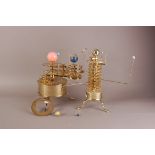 Two modern brass orrery, one a Zodiac orrery, the other a planet orrery, some elemnents loose,