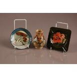 Three modern Moorcroft pottery items, including a mushroom decorated vase, 10cm, an ashtray and a