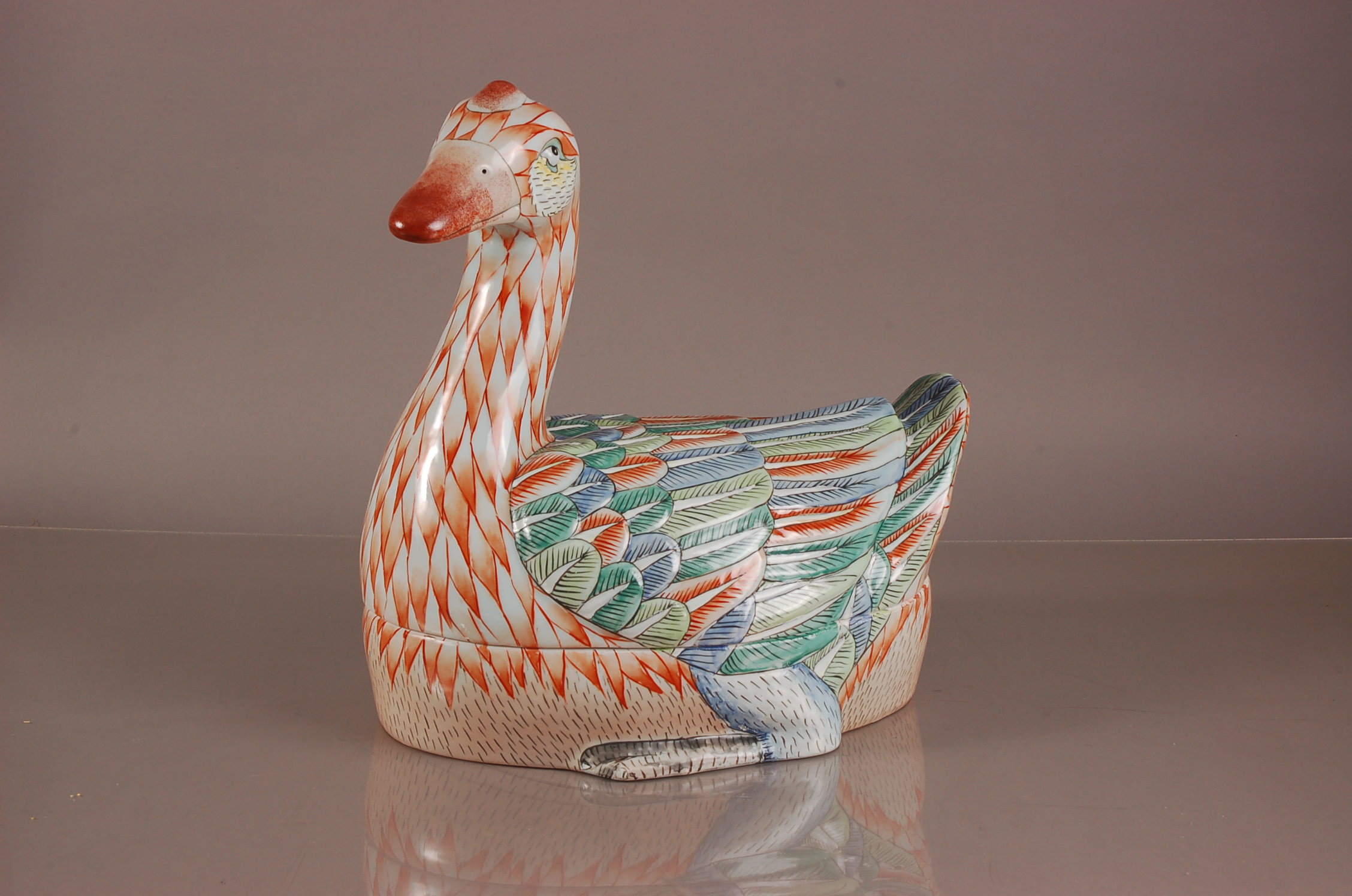 A large modern Chinese porcelain duck turreen, 37cm high, in two sections, with four character