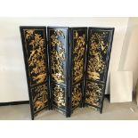 A modern Chinese lacqued four panel screen, each panel 183cm high and 46cm wide, AF