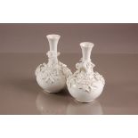 A pair of Victorian Stevensons & Hancock blanc de chine porcelain vases, 16cm, globular with tapered