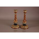 A pair of late Victorian Doulton Lambeth stoneware candlesticks, 30cm, marked Ep or BP and number
