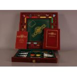 A modern Franklin Mint Monopoly board game, 53cm wide, with drawer to hold money and gilt metal