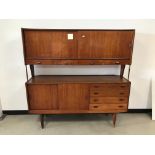A c1960s Danish teak sideboard cabinet by Peter Lovig Nielsen, 158cm by 158cm, lower section with