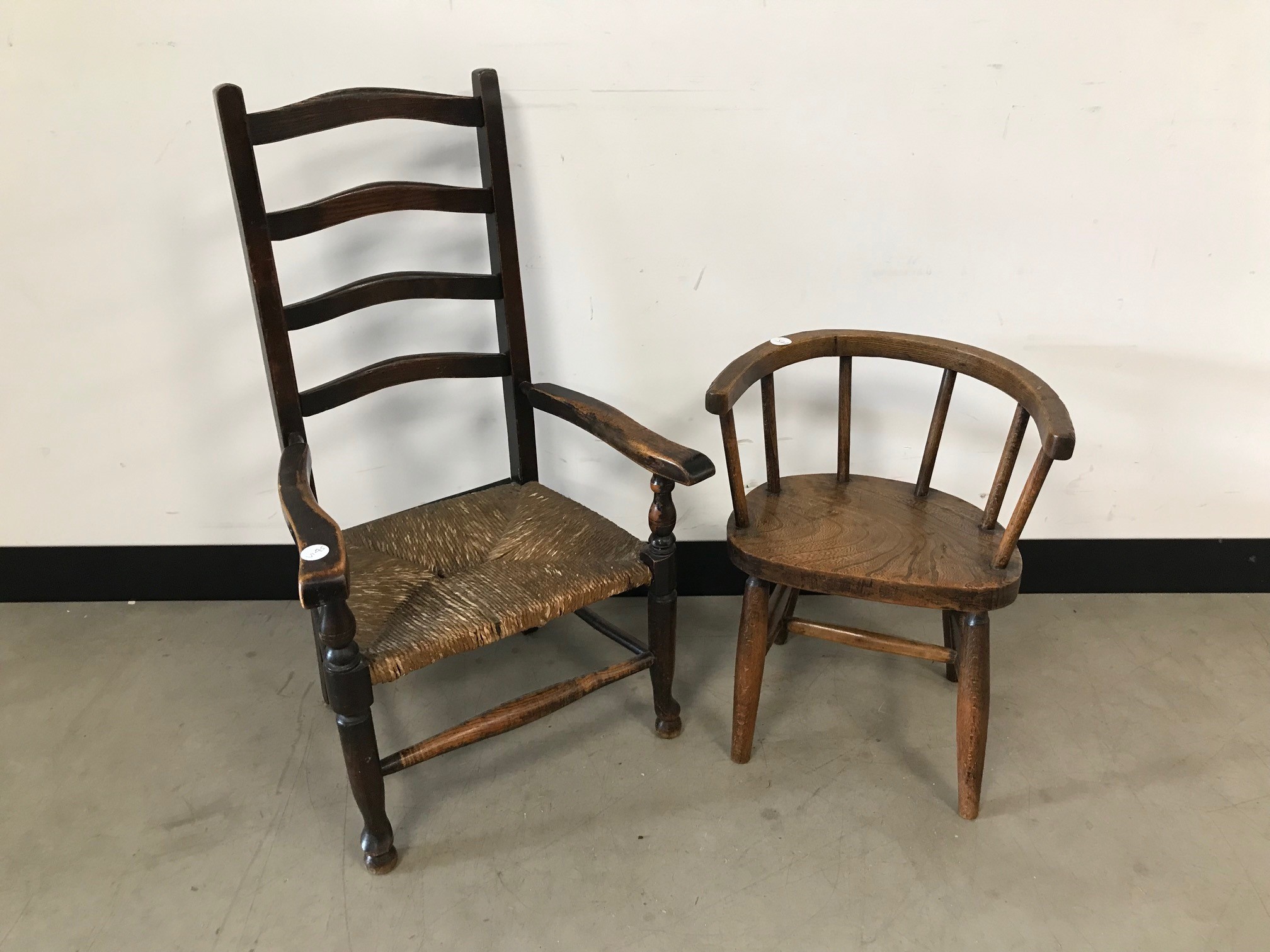 Two vintage children's chairs, one ladder back, the other with horseshoe shaped top rail (2)