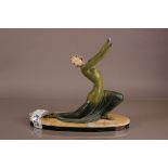 An Art Deco style spelter figure, AF, modelled as a young lady in green dress, hands loose and