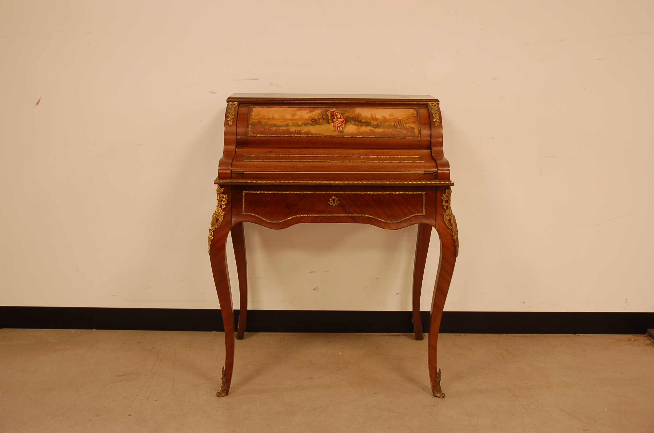 A mid 20th century mahogany lady's writing desk, the Louis XVI style small desk with drawer
