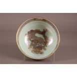 A Wedgwood pottery lustre bowl, 24.2cm diameter, numbered Z4928, with gilt dragon to well
