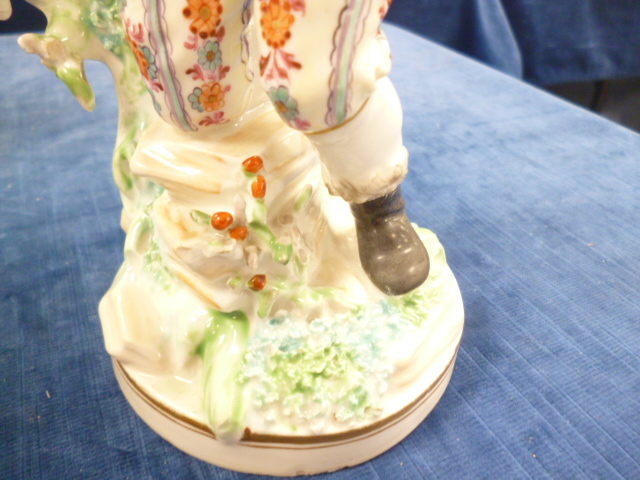 A 19th century British porcelain figure of a young woodsman, proabably Derby, modelled walking - Image 6 of 6