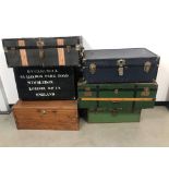 Six vintage travel trunks