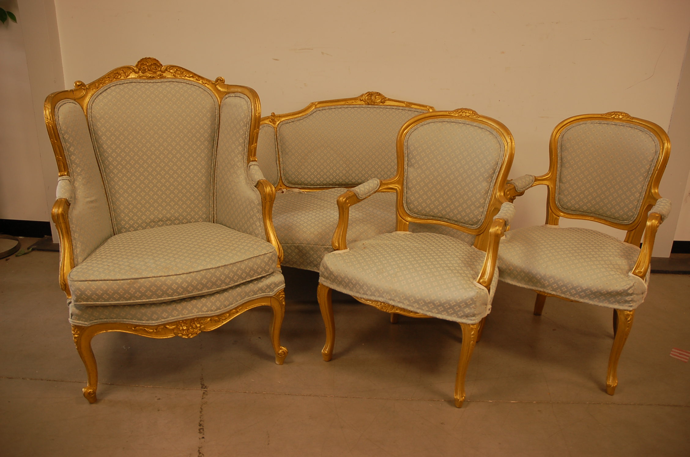 A harlequin set of four chairs in the Louis VI & VI style, including a pair of carver dining chairs,