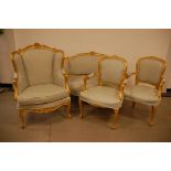 A harlequin set of four chairs in the Louis VI & VI style, including a pair of carver dining chairs,