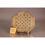 A modern Middle Eastern chess board and set, the octagonal inlaid board with metal figures