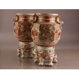 A pair of first half 20th century Japanese Satsuma style pottery jars and stands, 45 cm high, with