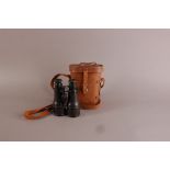 A pair of WWII period field binoculars, with leather case marked T French (2)