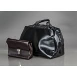 A c1990s Bally black patent leather lady's holdall and a Bally handbag, 46cm wide, with some wear,