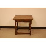 An antique oak small table, 60cm wide, top loose, with single drawer, probably 18th century with
