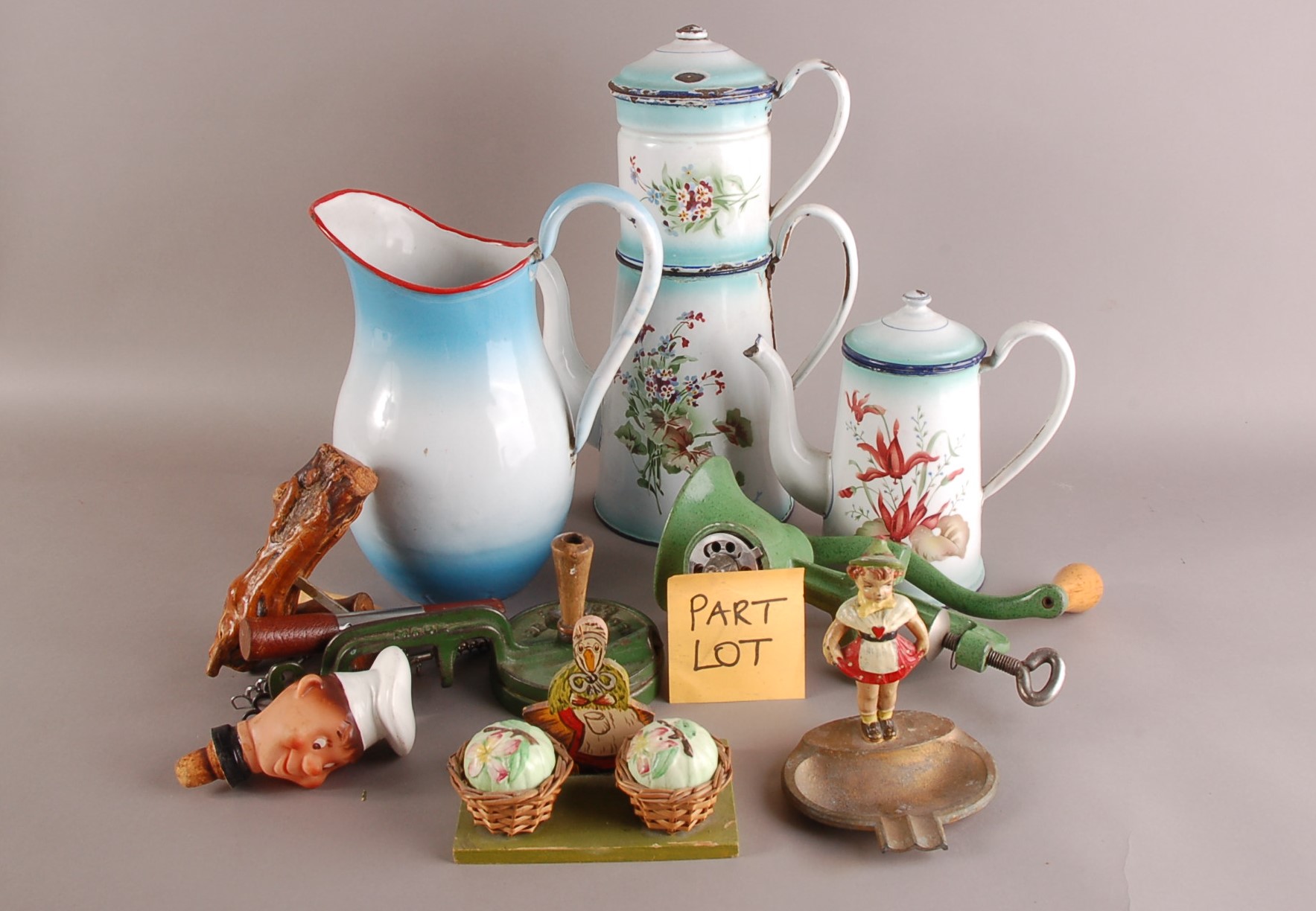 A mixed lot of kitchenalia, including three comical modern waiters, one as a doorstop, also a tin