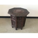 A mid-20th century Anglo Indian hardwood ocassional table, octganal lift off top 54cm wide, on
