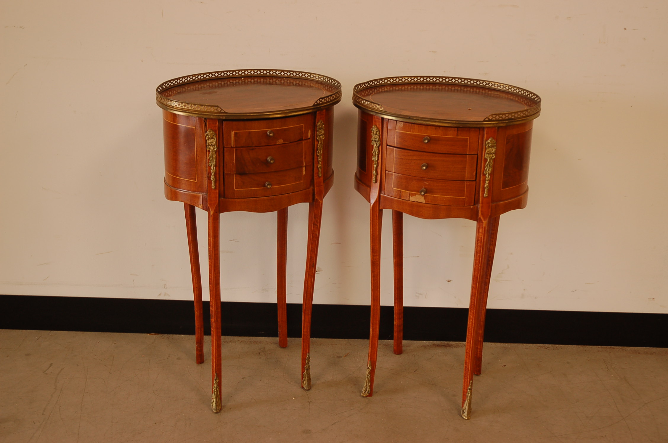 A pair of mid 20th century Louis XVI style bedside cabinets, 70cm high and 40cm wide, with applied