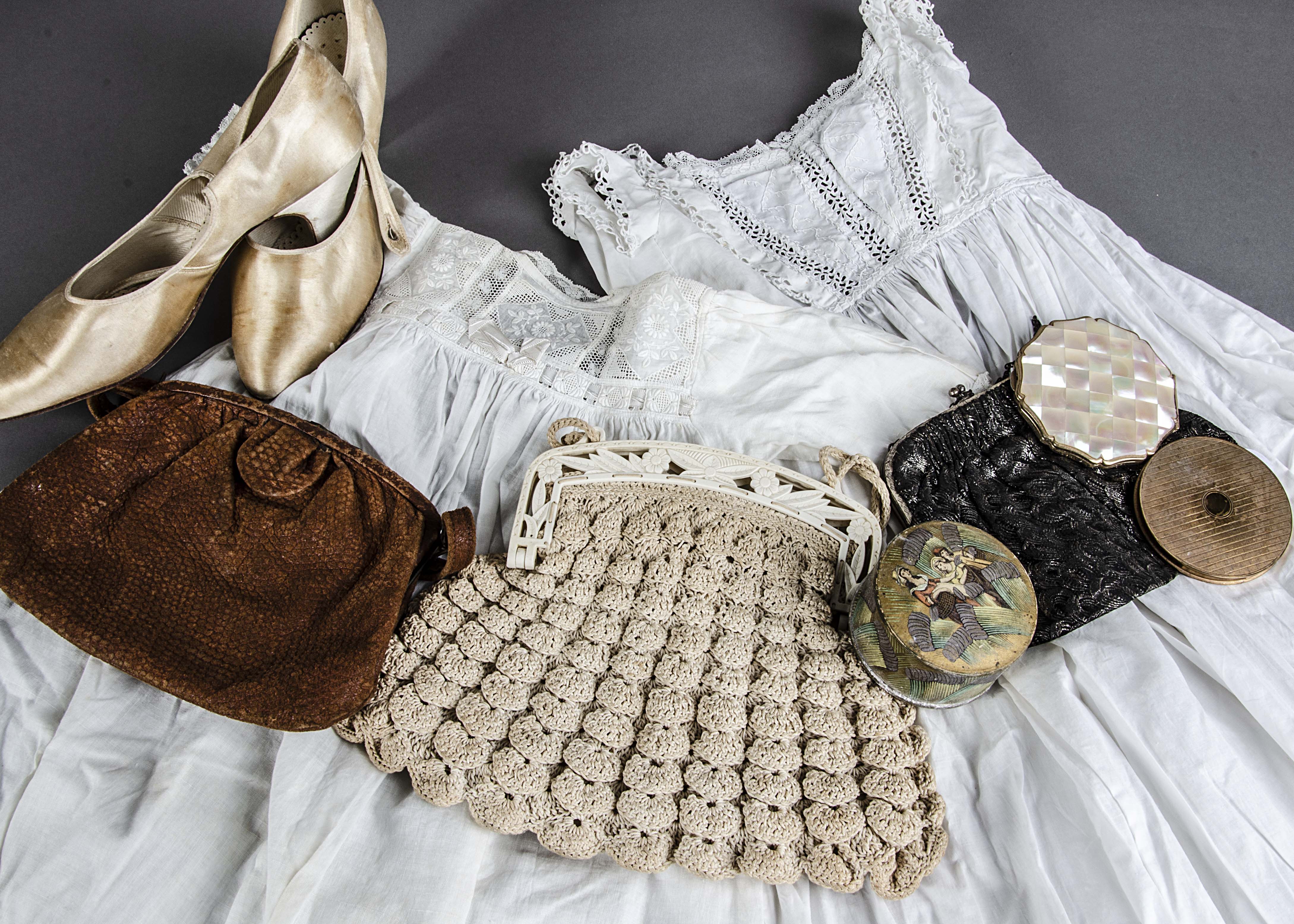 A small collection of 20th century clothes, including three mid 20th century skirts and a polka
