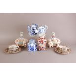 A small group of oriental porcelain items, including a pair of modern figural candle holders in