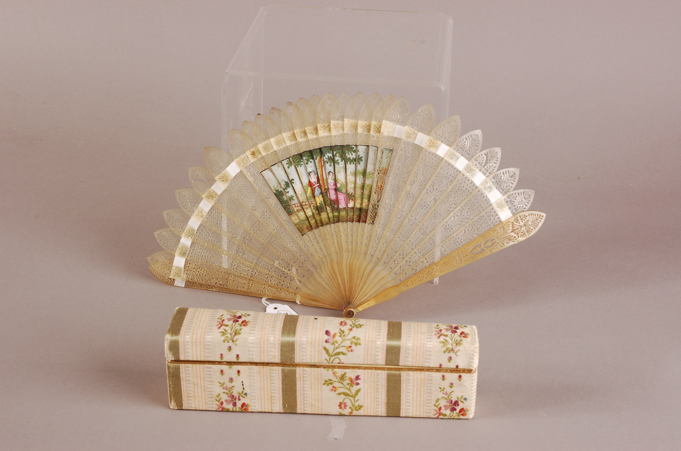 An early 19th century double image Brise fan, 15cm, finely pierced guards and stickes, modern