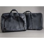 Two modern Ferrari black leather items of luggage by Schedoni, including a rectangular suitcase,