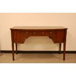 A George III mahogany sideboard, 148cm wide, on tapered supports with two drawers and doors