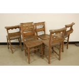 A set of six mid-20th century church chairs, with bible box to rear