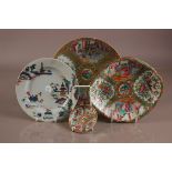 Four 19th century and later Chinese porcelain dishes, three in the Canton palette with painted