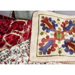 A collection of textiles, mainly 20th century including a Sindh embroidered shawl