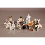 A collection of 16 second half 20th century ceramics pussy cats, including a Royal Crown Derby