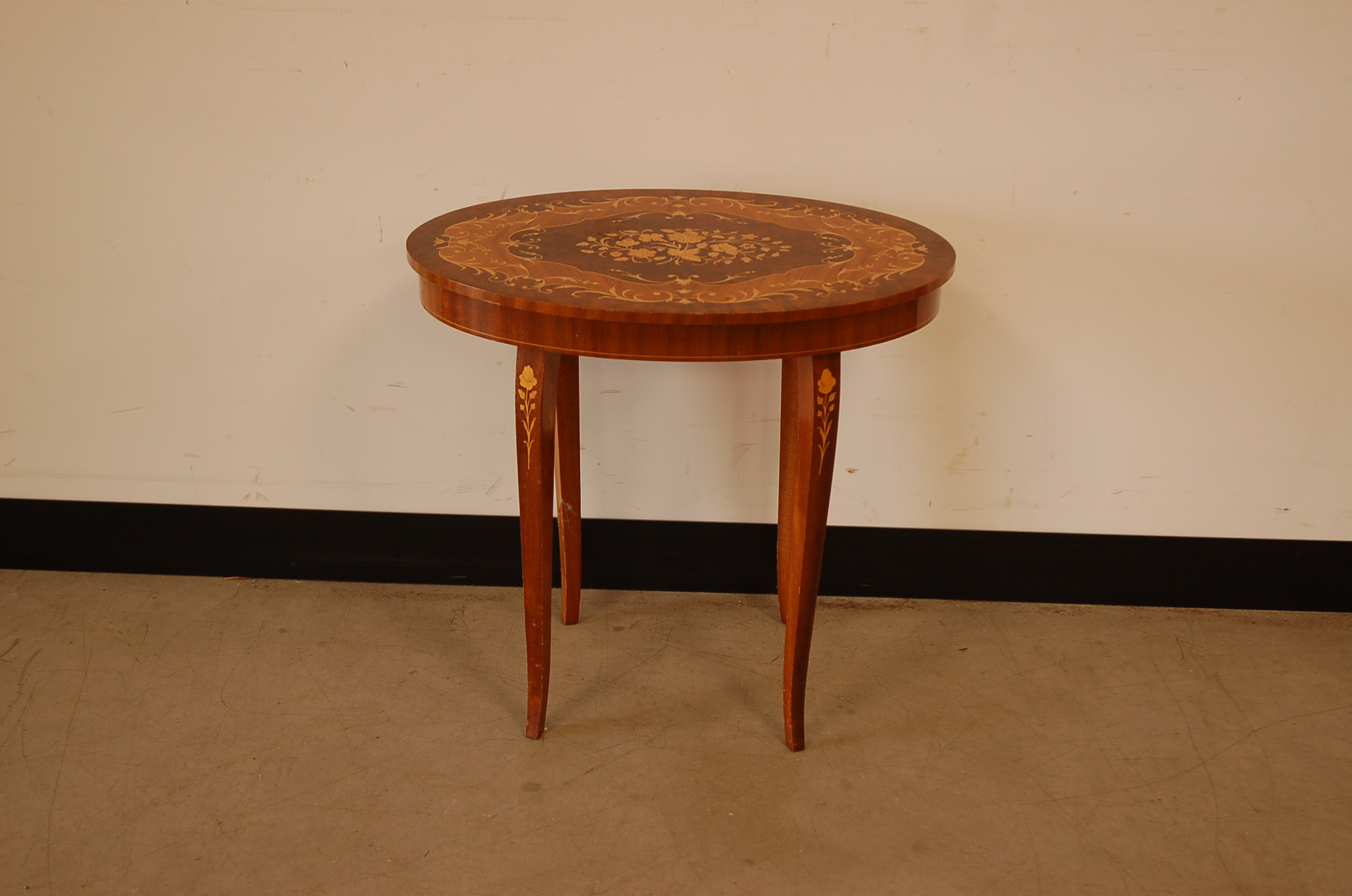 A small second half 20th century inlaid musical table