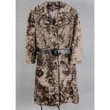 A vintage lady's sheepskin trench coat, with brown leather coat and satin lining, by Arthur Shaw,