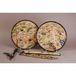 Two 19th century silk and embroidered circular fixed pan leaf fans, one with black lacquered