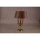 A late 19th century brass table lamp, 51cm, with three light fitings and adjustable tin shade