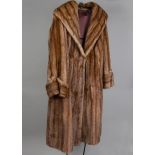 A vintage mink fur lady's coat, with brown satin lining, approx 110cm long