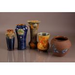 Three items of early 20th century Royal Doulton stoneware, the largest 28,5cm, together with a