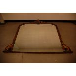 A 20th century walnut over mantle mirror, 135cm high and 158cm widest, with applied gilt and