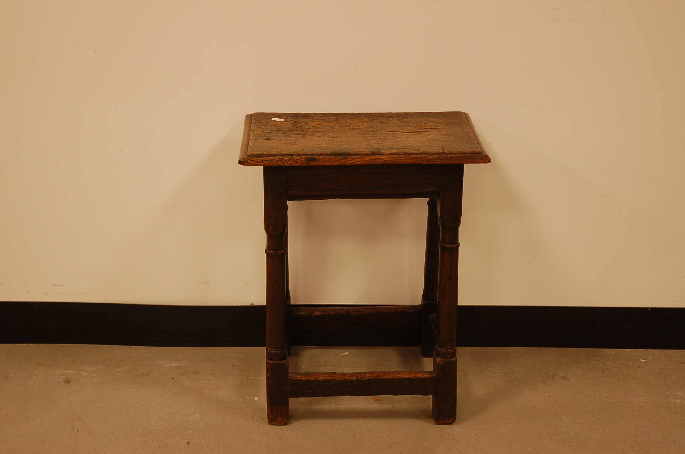 An 18th century oak joynt or joint stool,