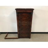 A damaged Victorian mahogany veneered Wellington chest, unfortunately lower section loose and wood