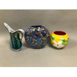 Three late 20th century items of art glass, including a flattened millefiori style vase, 39cm, a jug