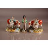 A pair of Victorian Staffordshire pottery figures and another, AF, including a man and a woman