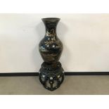 Two second half 20th century Oriental lacquer items, inlcuding a large damaged vase, 74cm, and a