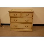 An early 20th century pine chest of drawers, 91cm wide, now painted in light green heightened with